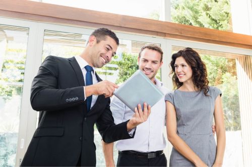 Real estate agent busy with clients